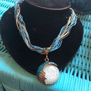 Beaded and cord necklace